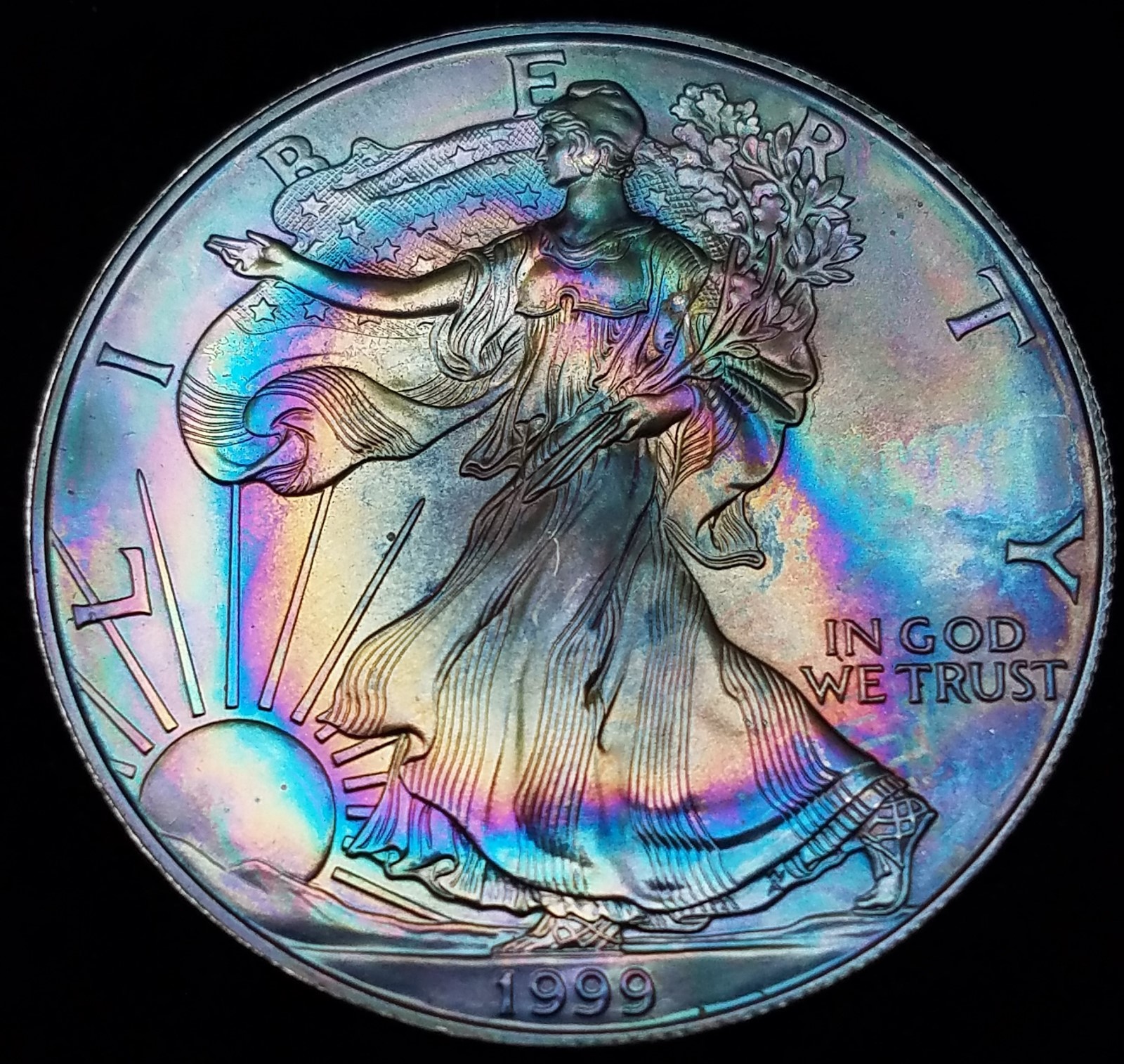 GREAT TONING * 1999  RAINBOW TONED SILVER EAGEL * GEM BU -GREAT LUSTER- 100500