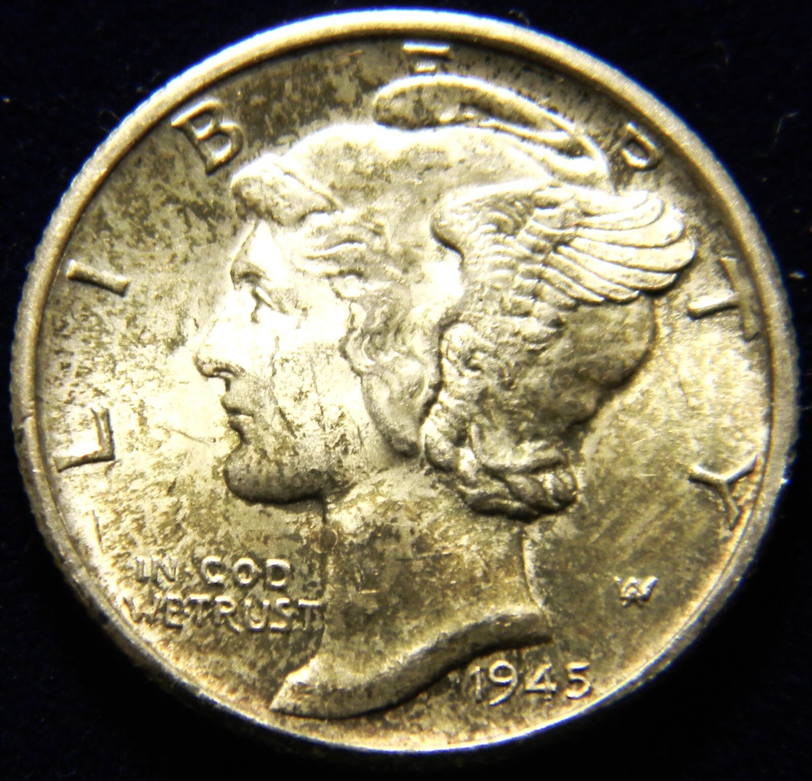 1945-S MERCURY DIME WITH FULL BANDS. GRADE IS GEM BU, TONED