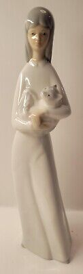 Stunning, tall, and slim Porceval porcelain figurine female holding a cat