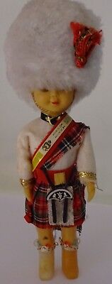 A doll in the costume of a Scottish Guardsman.1970s Free International Shipping