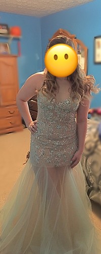 Aqua/teal prom dress size 6. It’s embellished with sequins in various places.