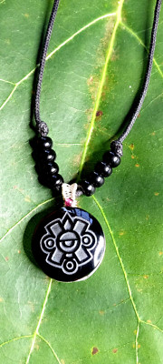 Nahui Ollin black obsidian necklace with sterling silver wire.