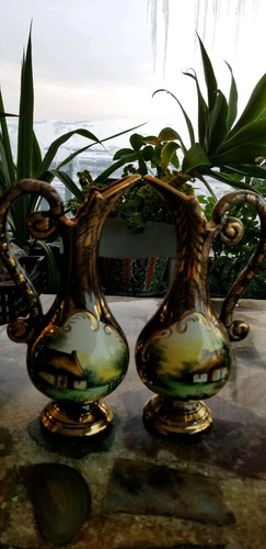 Belgium ceramic pair of pitchers