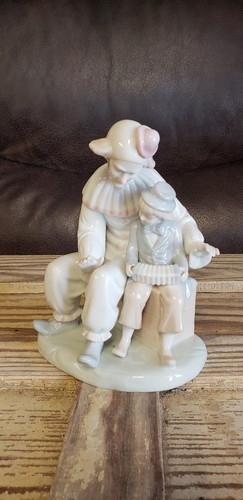 Porcelain Clown Figurine with Boy Playing Accordion