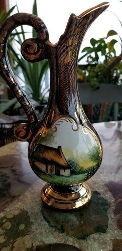 Belgium ceramic pair of pitchers