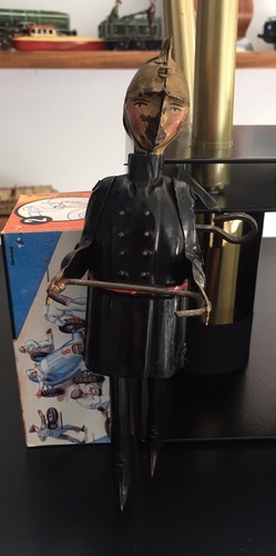 1. Karl Bub Firetruck 1930s?; 2. Fireman Gunthermann 1900s? Tin Toys Germany,