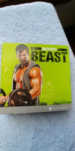 BODY BEAST DVD WORKOUT W/NEW CALENDAR, BONUS CD & BOOK OF BEAST
