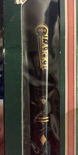 The original CLARK TIN WHISTLE, NIB, Color Is Black, With Practice Sheet