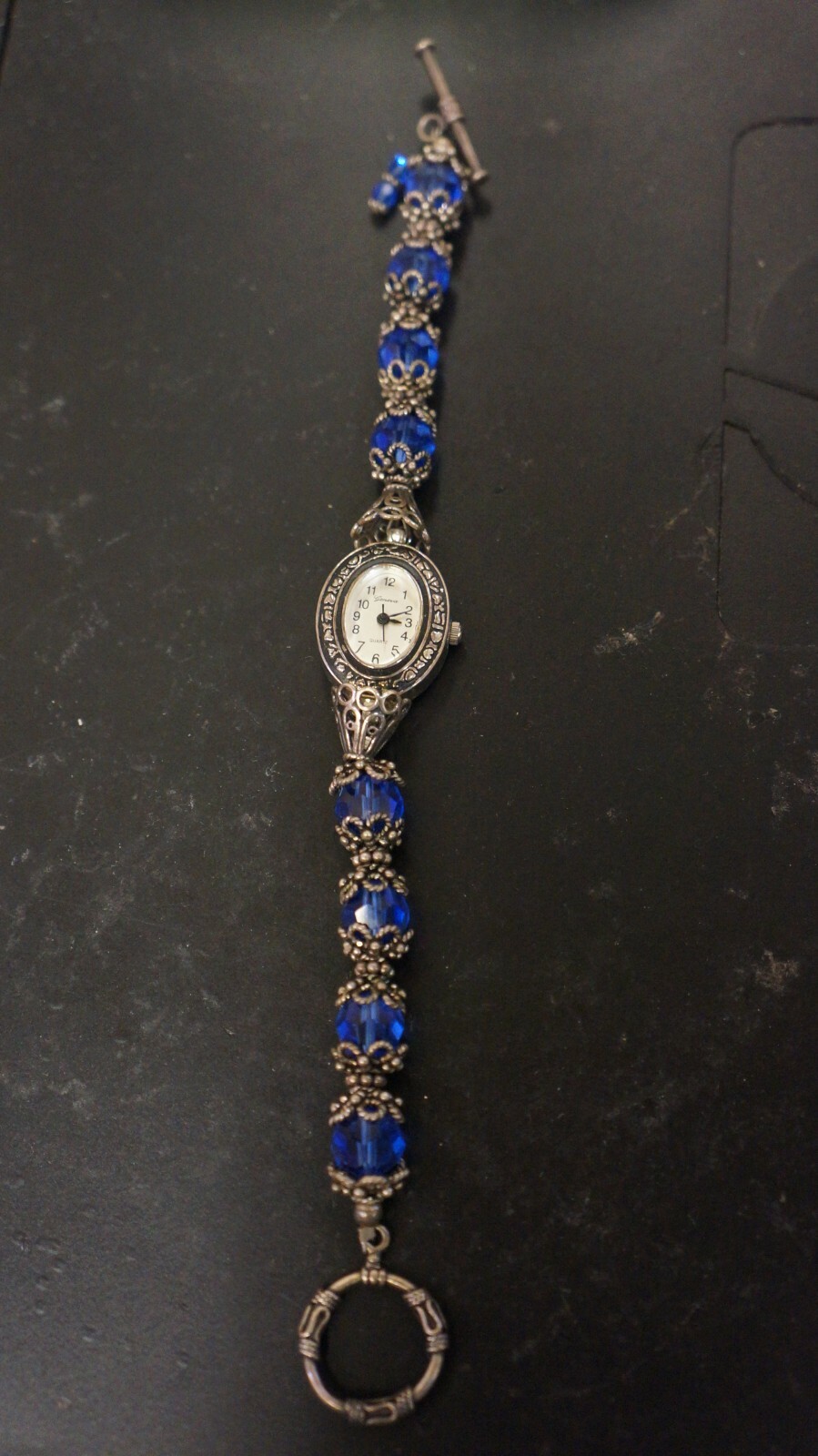 GENEVA QUARTZ OVAL JAPAN MOVEMENT WOMENS WATCH W BLUE STONES GENEVA QUARTZ OVAL JAPAN MOVEMENT WOMENS WATCH W BLUE STONES