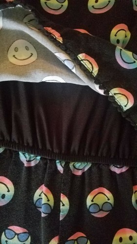 Justice girls Romper Shorts Size 14. Happy face pattern.