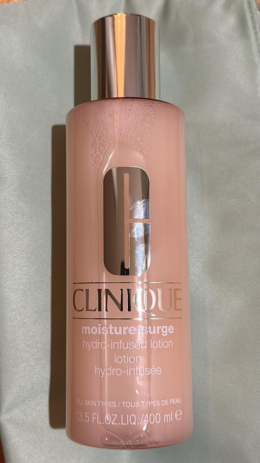 CLINIQUE Moisture Surge HYDRO Infused LOTION With Free Pouch
