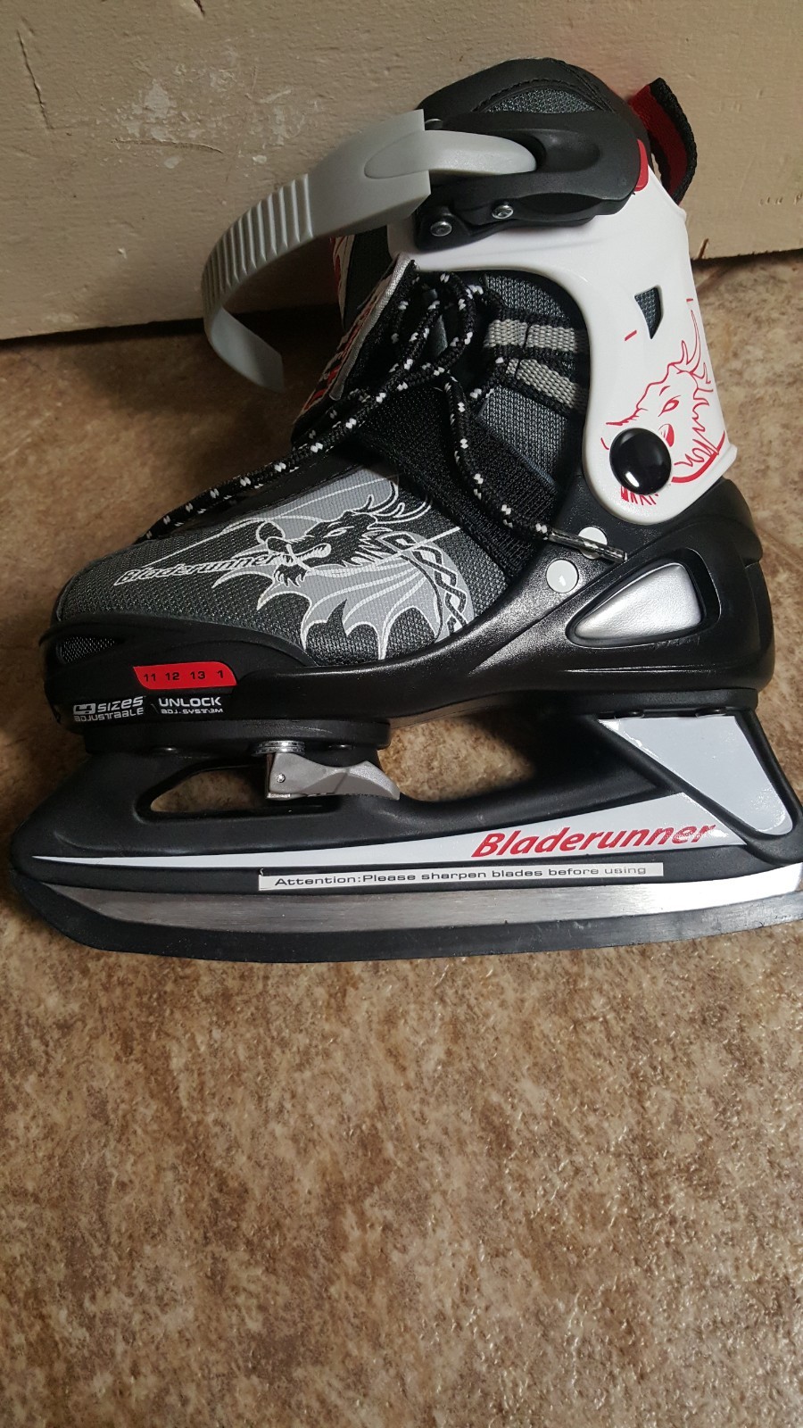 Boys ice skates (bladerunner) 4 adjustable sizes 11-1. Black, white, red