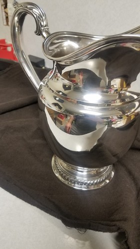 Rogers Sterling Silver Pitcher.