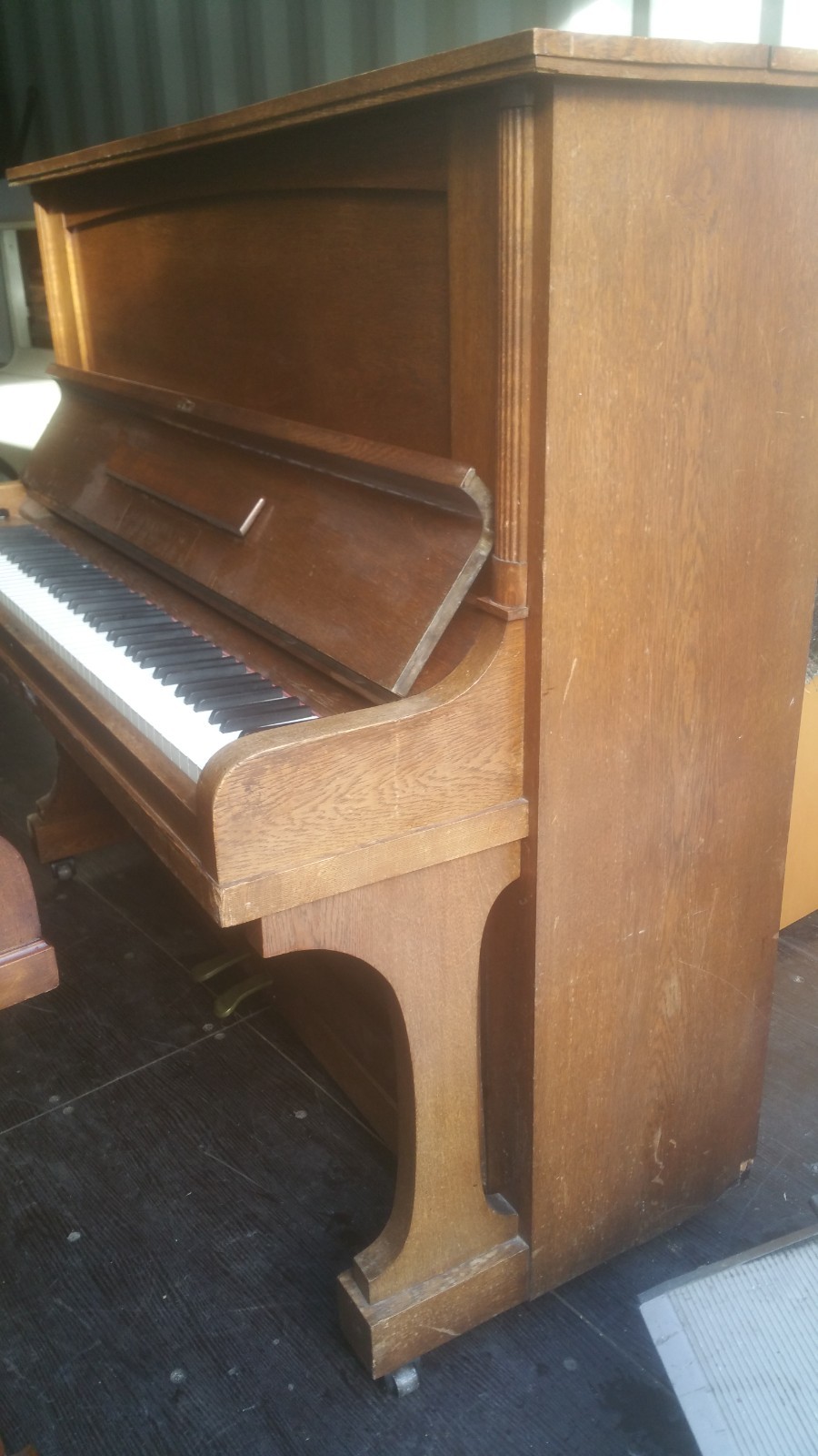 Upright piano made by the reputable piano maker Schaller and cia