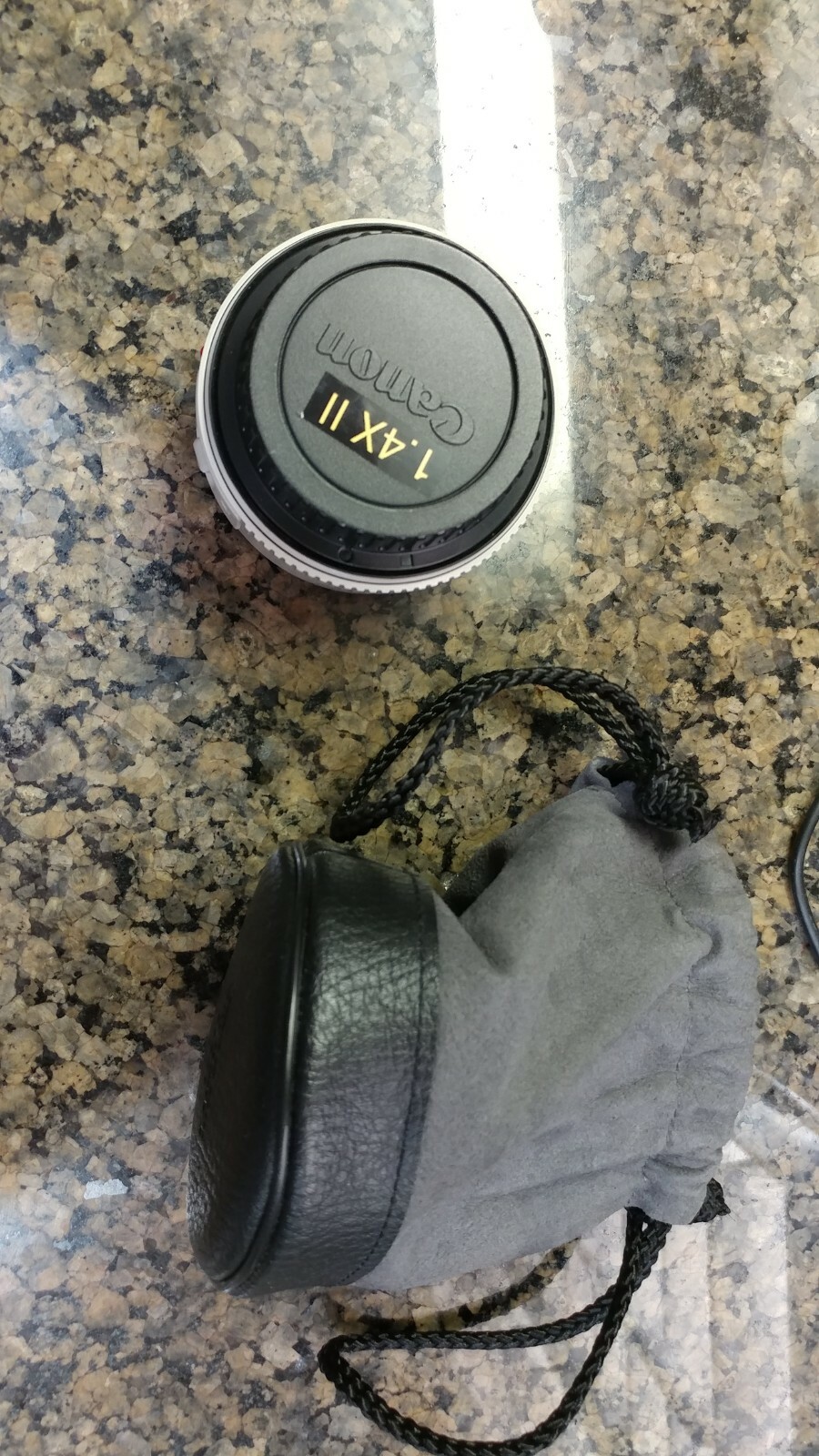 Canon Extender EF 1.4x II Mint condition.  Pouch and end caps included.