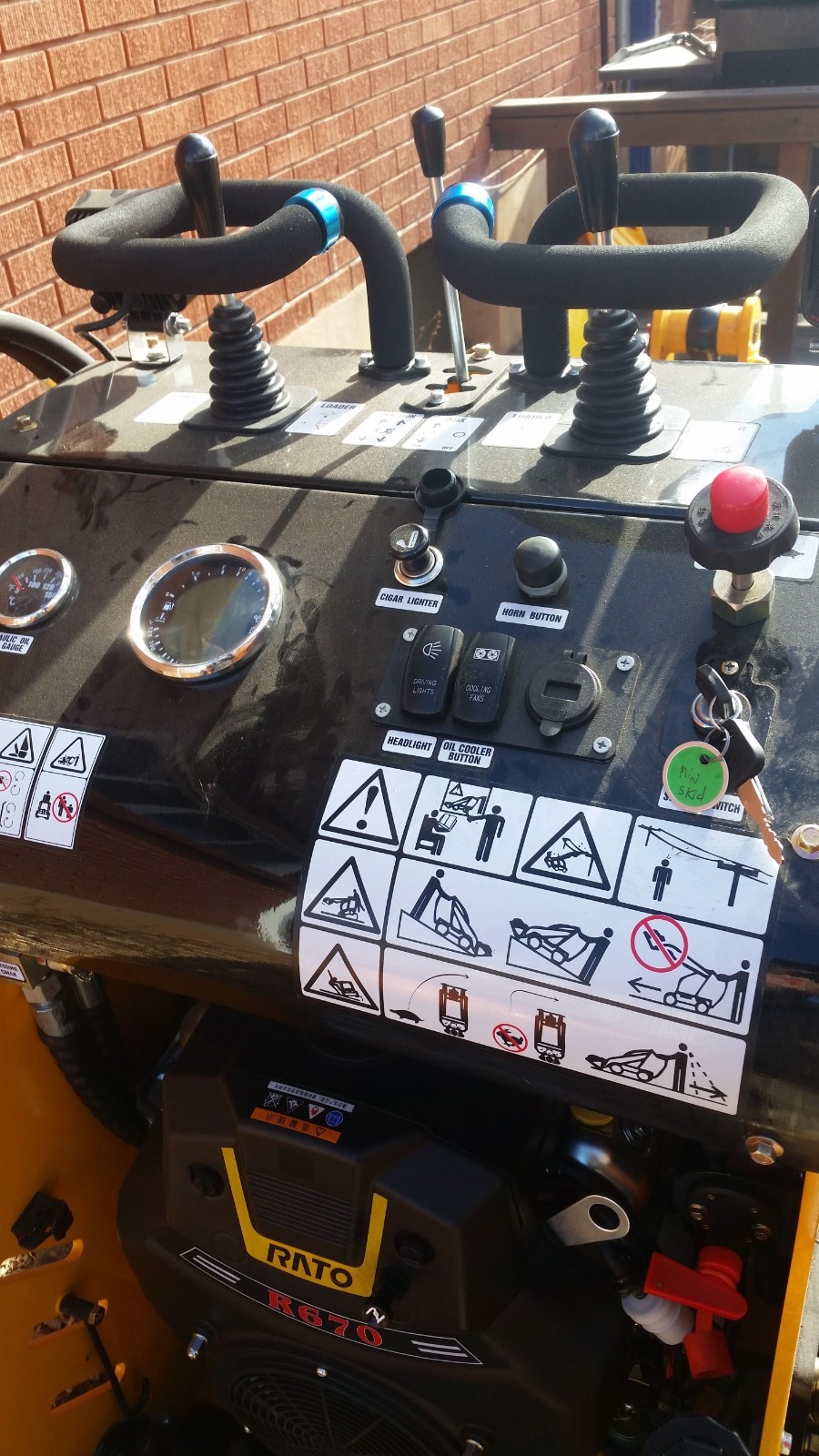 Mini Skid Steer, Infront Machinery Construction. Comes with bucket & Snowblower