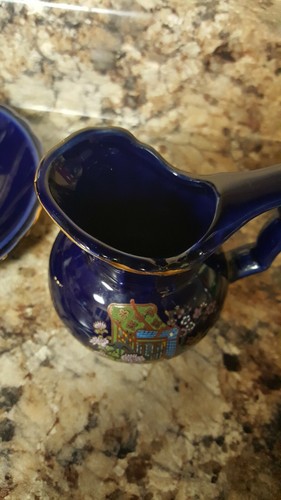 Vintage Beautiful Japanese Creamer And Saucer.