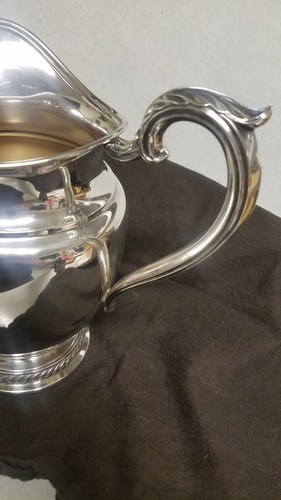 Rogers Sterling Silver Pitcher.