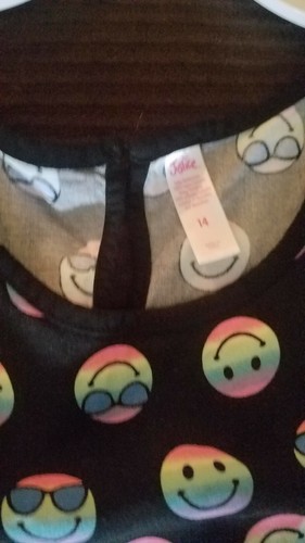 Justice girls Romper Shorts Size 14. Happy face pattern.