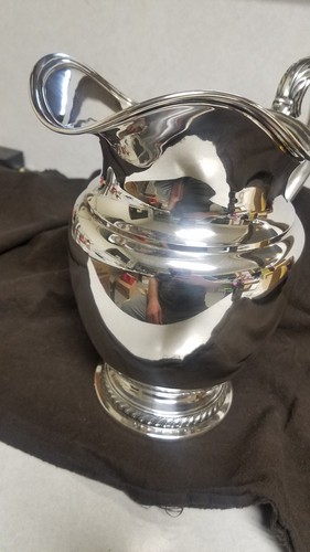 Rogers Sterling Silver Pitcher.
