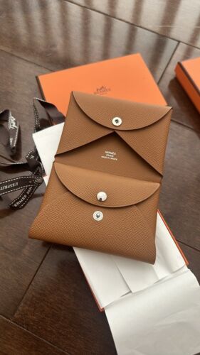 BNIB Authentic Hermes Calvi Duo Gold Full Set Unused with BNIB Authentic Hermes Calvi Duo Gold Full Set Unused with