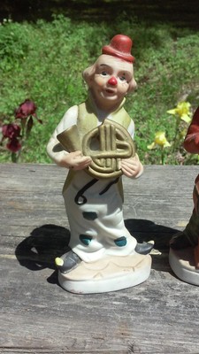 2 vintage clown ceramic bisque one with french horn one with drums