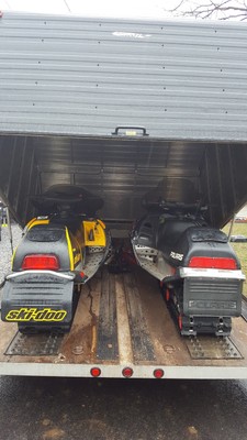Two Snowmobiles and Enclosed Trailer Package