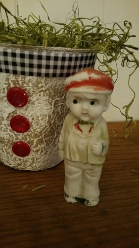 VINTAGE CERAMIC BISQUE FROZEN CHARLOTTE DOLL  ~ FIGURINE IN NEST BASKET