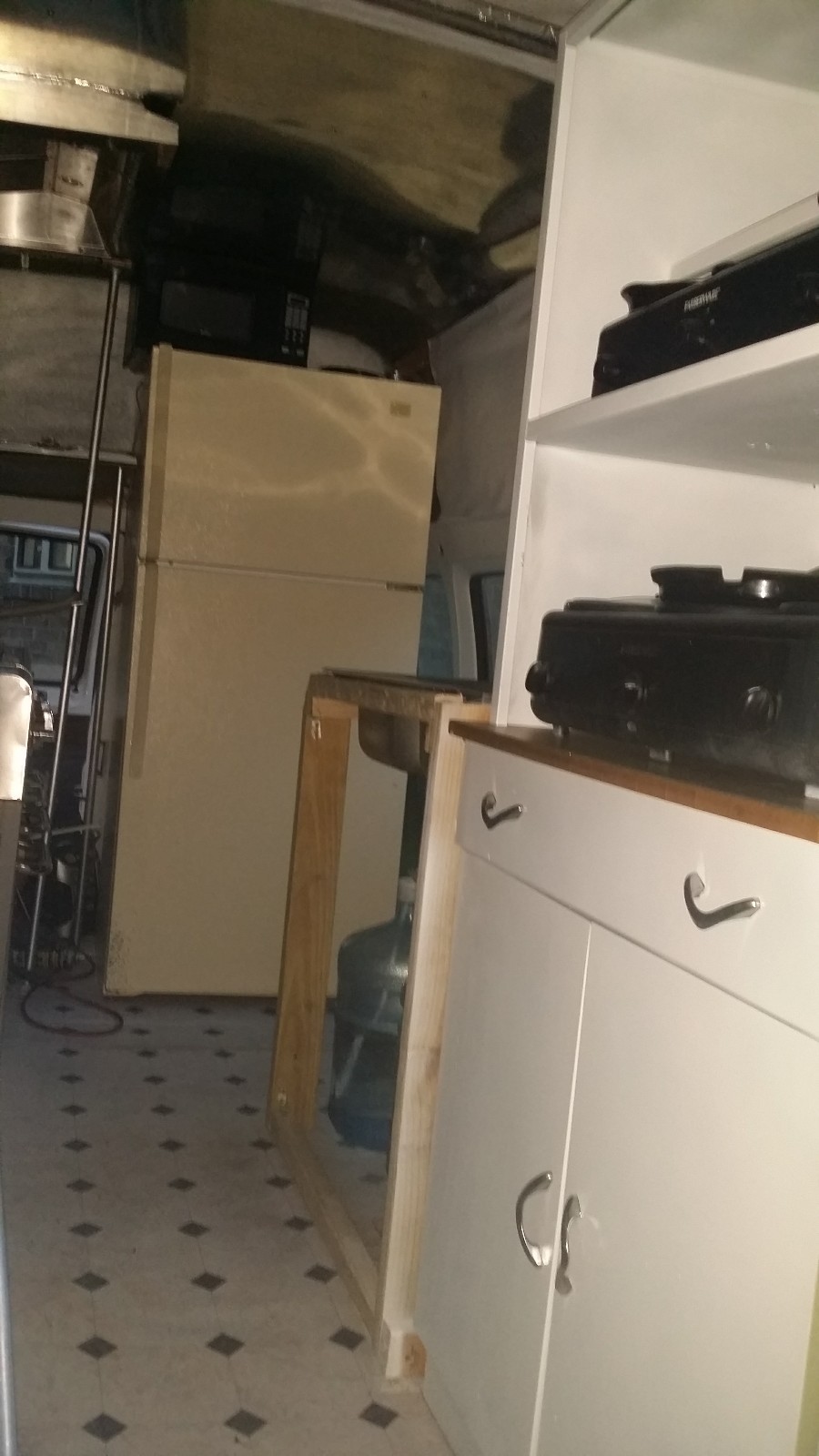 Food Truck van 53.000 miles on van.leave bid I will get back to you . 3 sinks