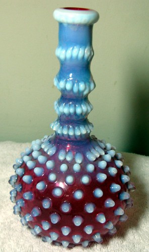 A Nice Antique Cranberry Opelescent Hobnail barber bottle