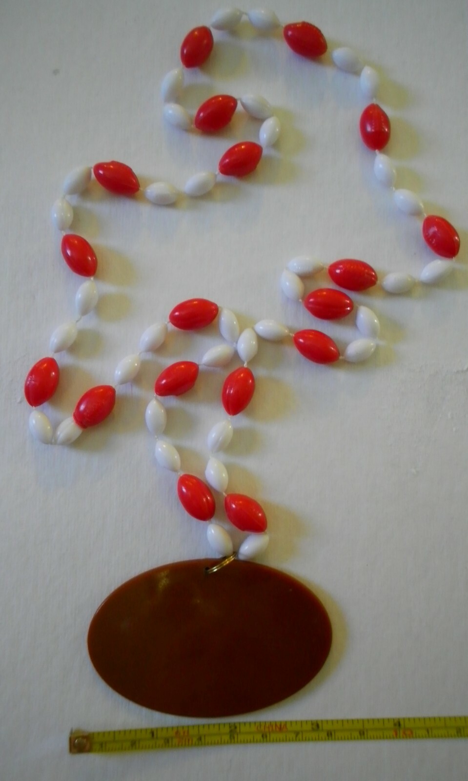 BUDWEISER. 125th playing cards, plastic Bud Bowl pendant and decoration.