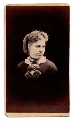 Antique CDV Circa 1870s Young Lady In Dark Dress Plaid Bow Lace Collar Unmarked