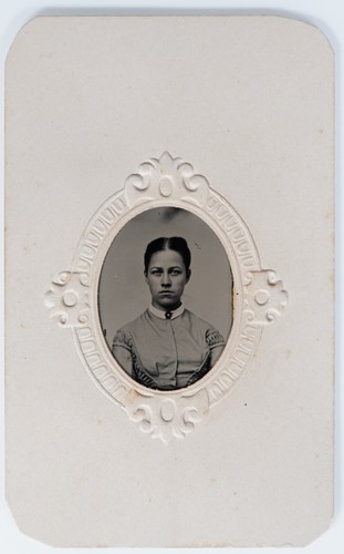 Antique 2.5x4in Tintype Serious Young Woman Center Part Hair Embossed Paper