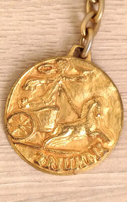 Vintage Porte-clefs, Triumph international, Auto Moto. Key ring, Lightly played.