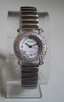 Women's Gruen floating stones silver finish stretch band fashion casual Watch