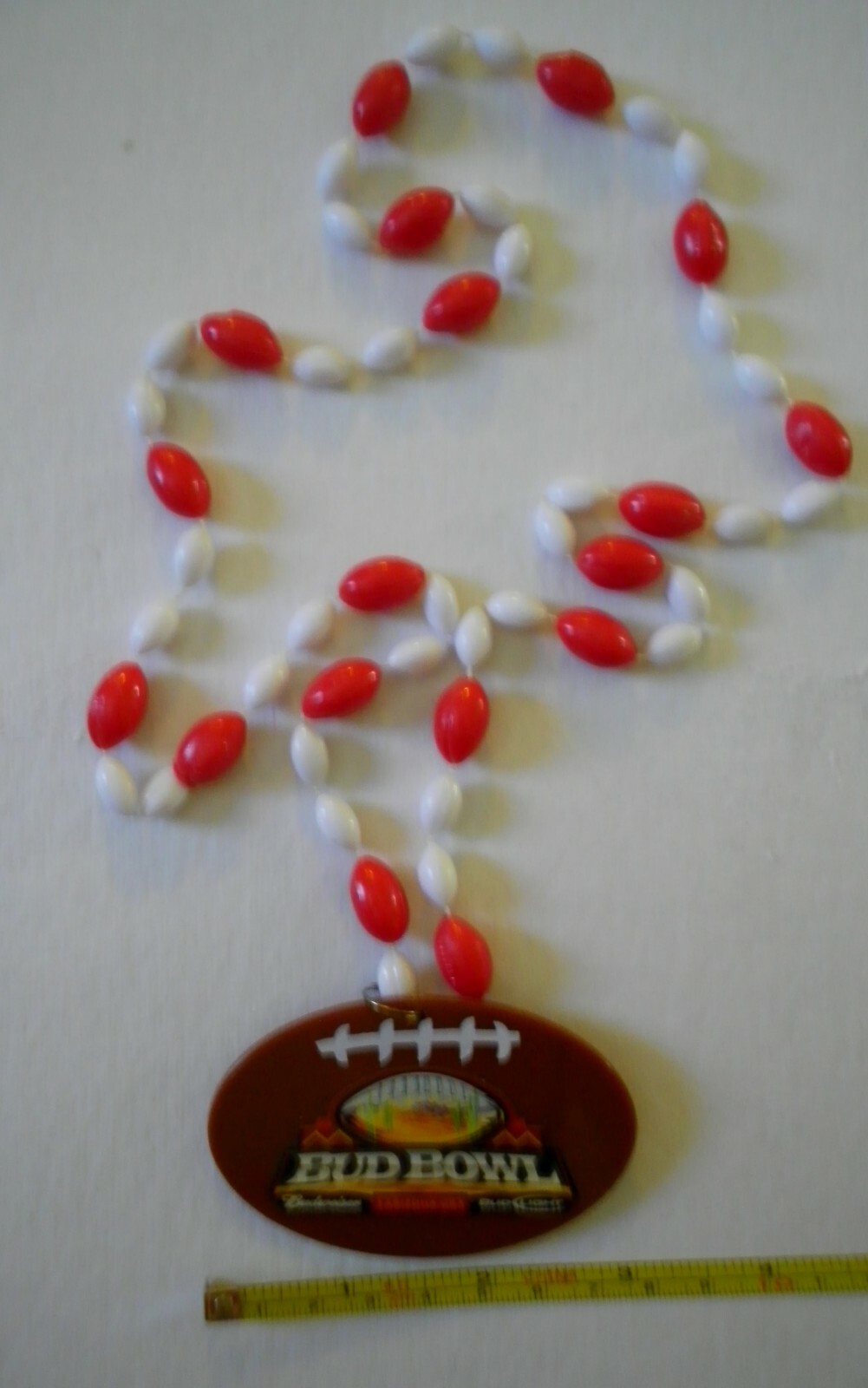 BUDWEISER. 125th playing cards, plastic Bud Bowl pendant and decoration.