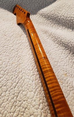 Beautiful USA Roasted flame maple neck. Fits a Strat style body.# MMS-P4