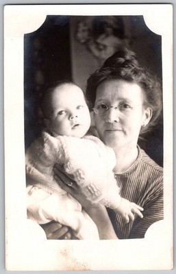 Antique RPPC Postcard Woman Glasses Holding Cute Baby Knitted 1910s