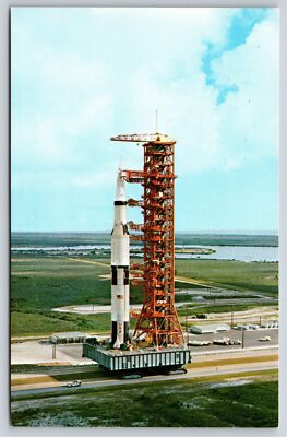 NASA~Apollo 4 Rocket Leaving Vehicle Assembly Bldg For Pad 39A~Vintage Postcard