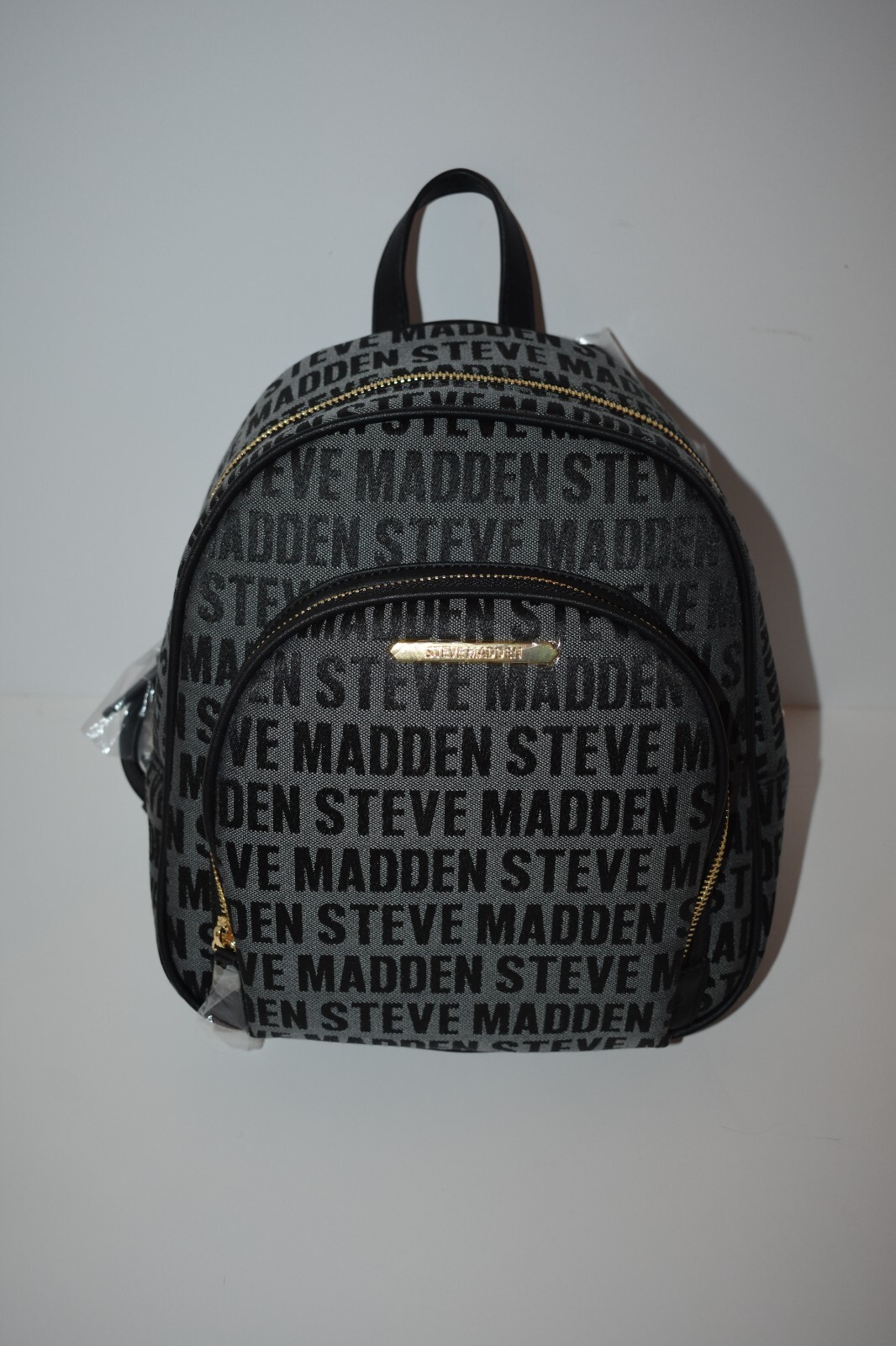 Steve Madden ロゴストラップ フラップ開封 ミニリュック 全4色 Steve Madden ロゴストラップ フラップ開封 ミニリュック 全4色