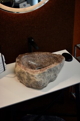 Small pink bathroom stone sink