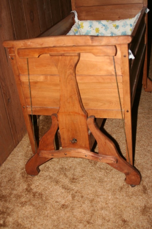 old wooden baby cradle