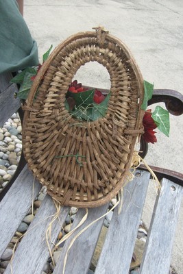 Hanging straw basket, Small decorative red mum arrangement.