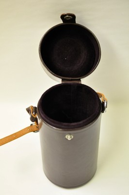 2-(two)Nikon leather lens cases. One for a 24,35 or 50. The other for a 200mm f4