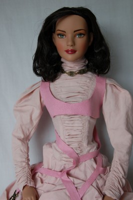 Tonner 22" Model doll with shouder length dark hair and wearing Magikal