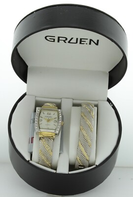 Ladies casual GRUEN bangle watch set two tone band and case with crystals bezel