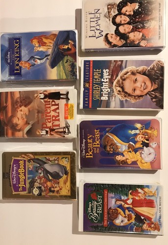 7 VHS Tapes. Jungle Book and Parent Trap are unopened. 4 Tapes are Disney.