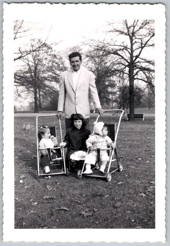Vtg B&W Snapshot Family Man Girl Babies In Strollers Park Outdoor Scene 1950s
