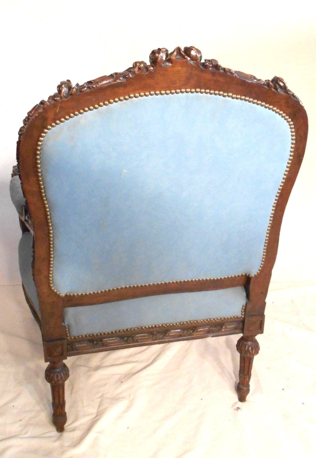 A GREAT OVERSIZE HAND CARVED VICTORIAN LOUIS XVI WALNUT UPHOLSTERED ARMCHAIR