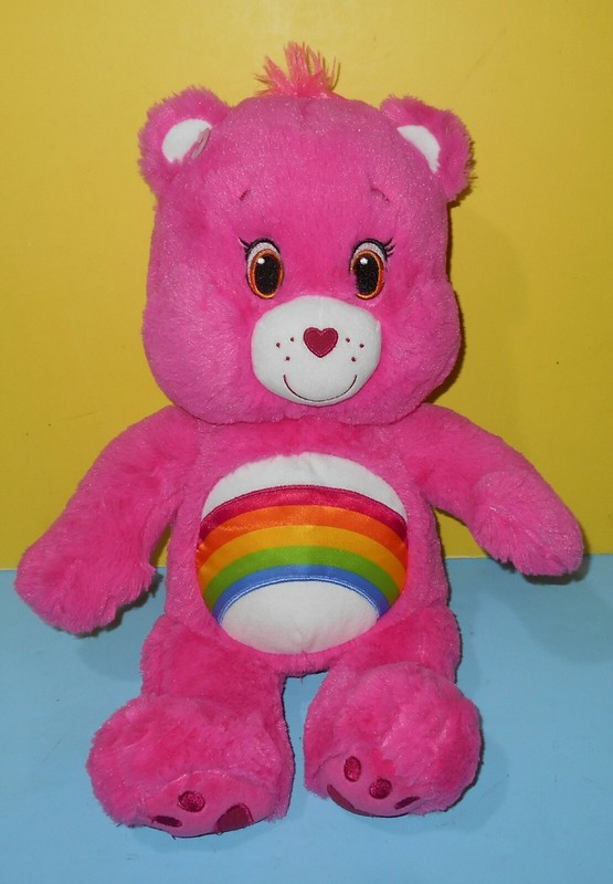 pink care bear with rainbow